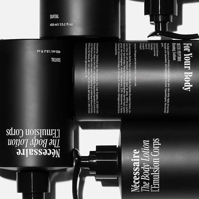 Nécessaire The Body Lotion with Pump. Santal. Multi-Peptide Firming Lotion to Moisturize, Firm, Strengthen. 2.5% Niacinamide, Vitamin C/E + Omega 6/9. 450ml / 15.2 fl oz-FemmiqueWomen